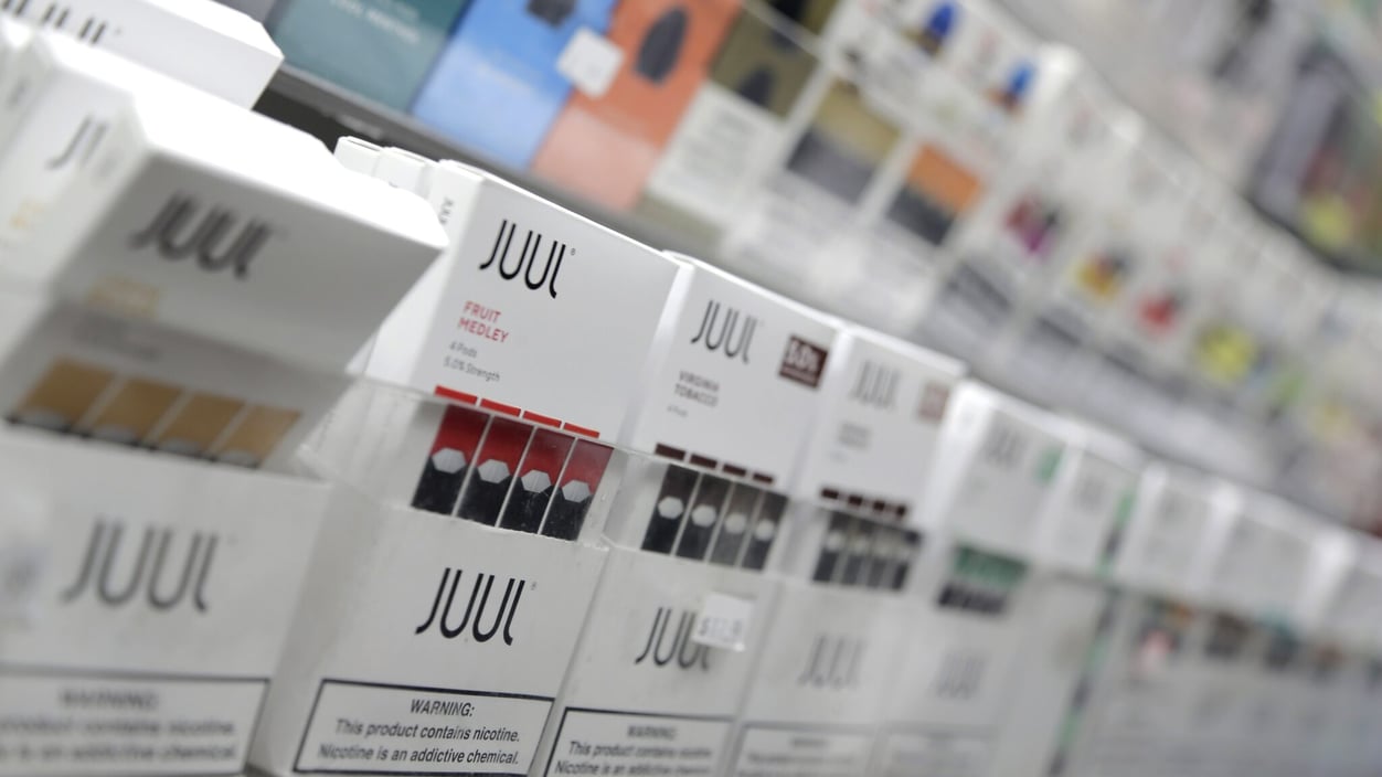 A photograph of Juul products displayed at a smoke shop in New York