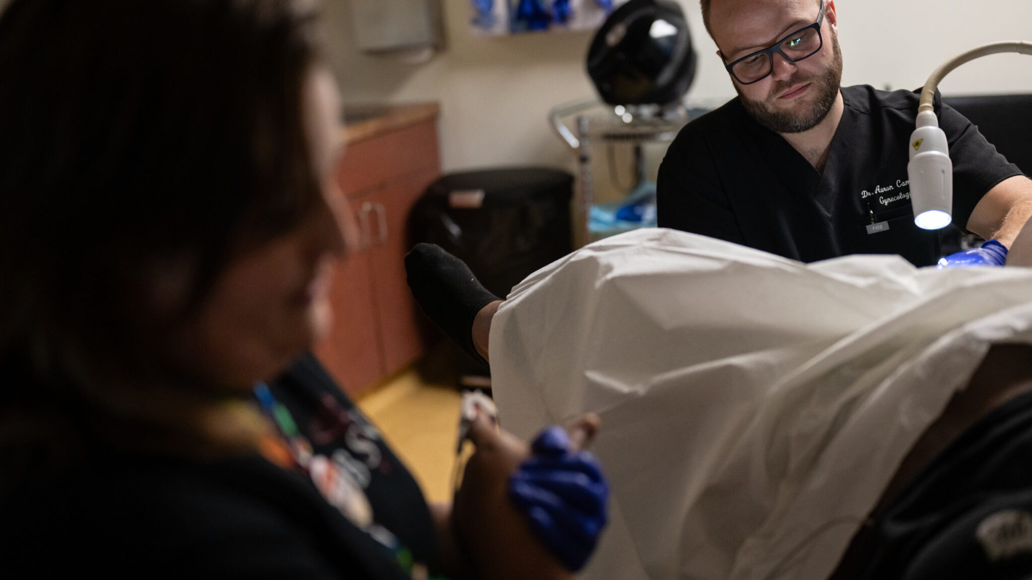 Aaron Campbell performs a surgical abortion at Allegheny Reproductive Health Center in Pittsburgh.