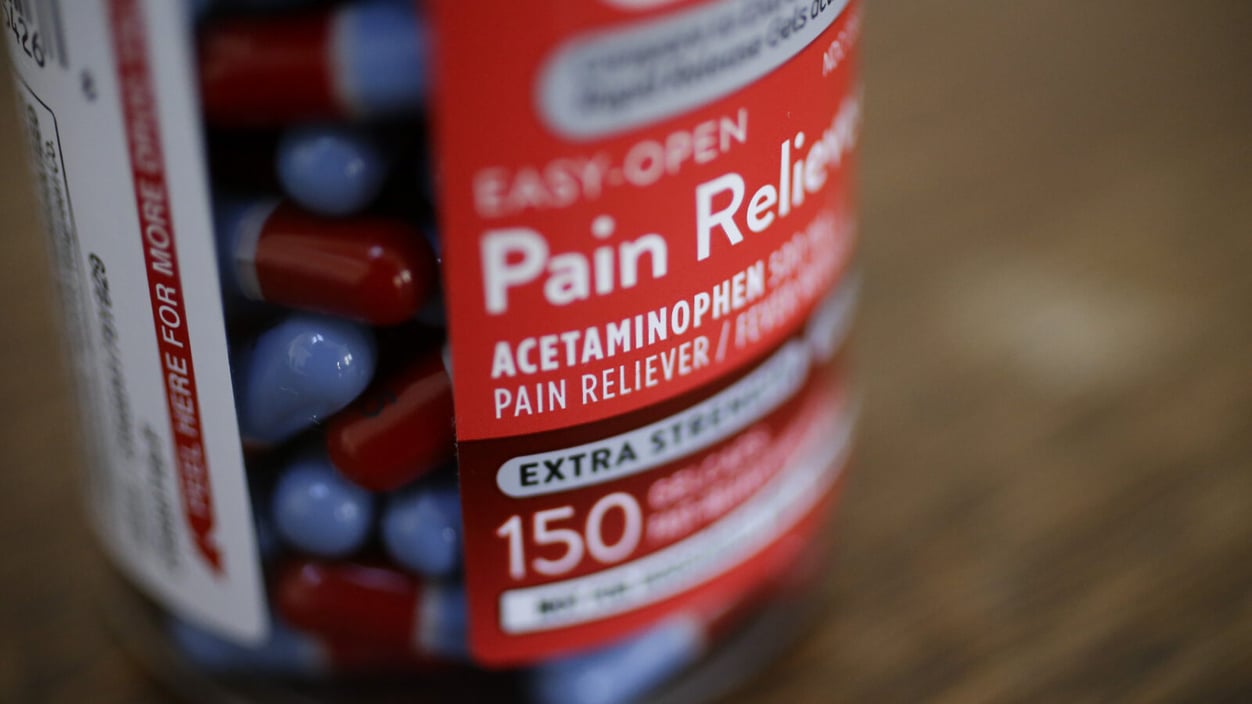 A close-up of a Tylenol bottle