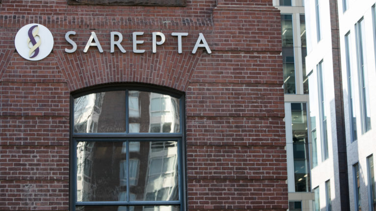 A view of the brick facade of Sarepta's headquarters in Cambridge, Massachusetts.