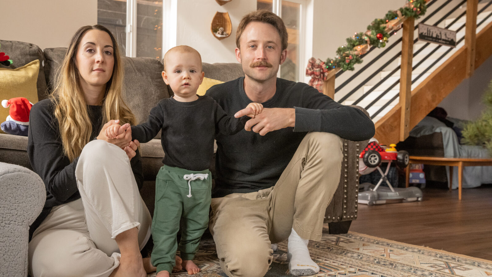 Declan Comerford, 22 months, with his mother, Jamie Dubuque, and father, Jesse Comerford, at home in Rimrock, Ariz.
