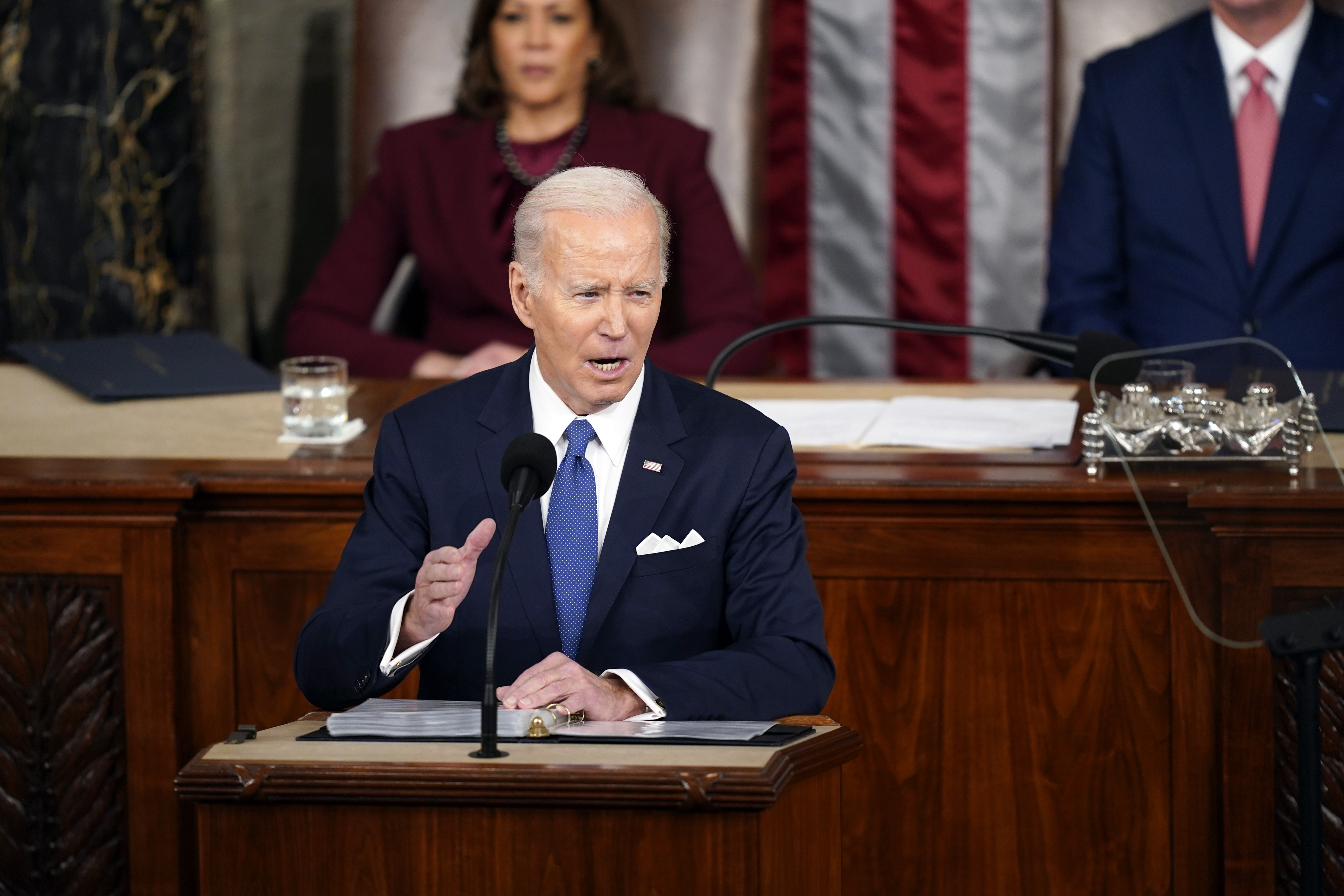 President Joe Biden delivers the State of the Union address to a joint session of Congress at the U.S. Capitol. Vice President Kamala Harris looks on.