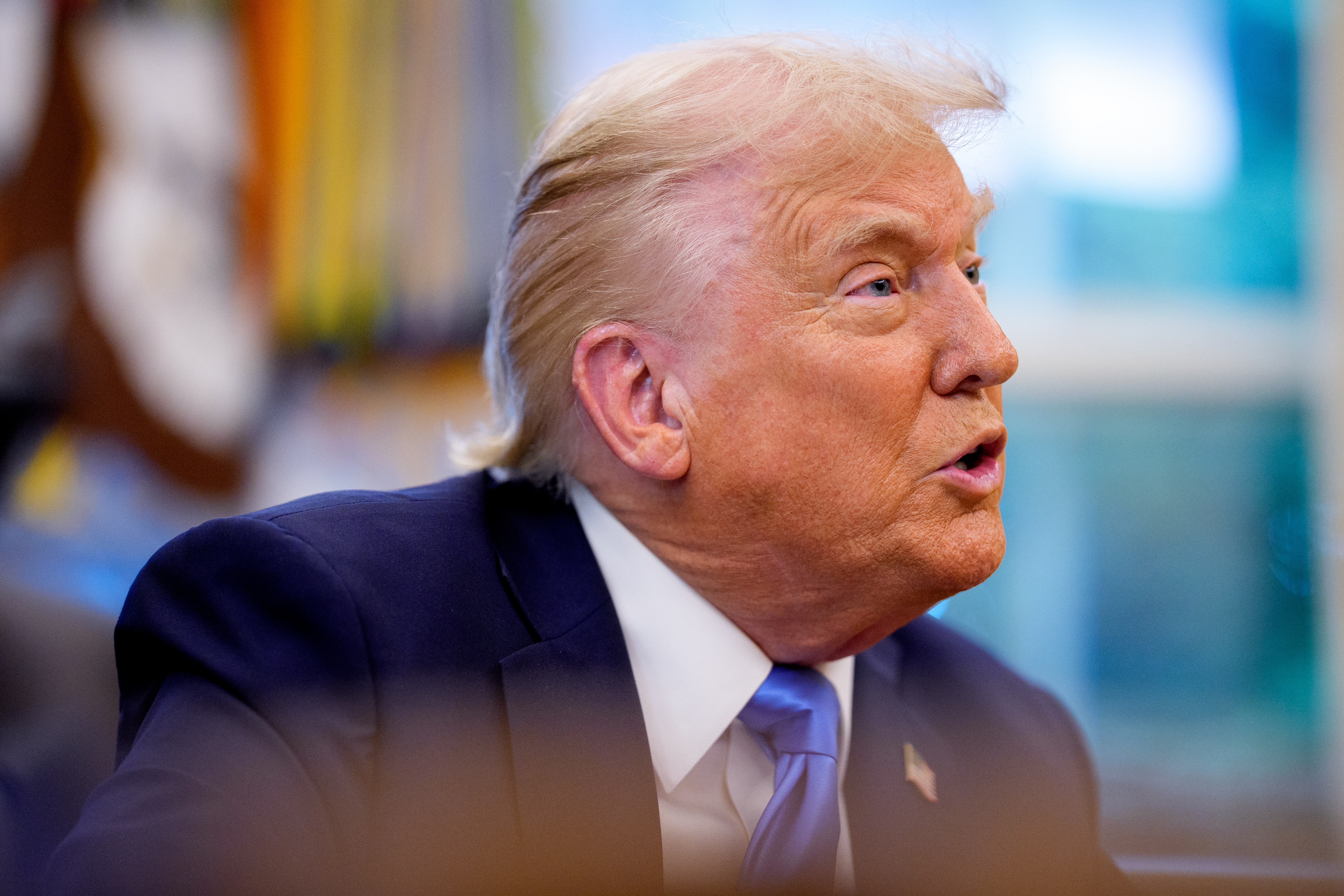 A close-up of President Trump speaking at the White House