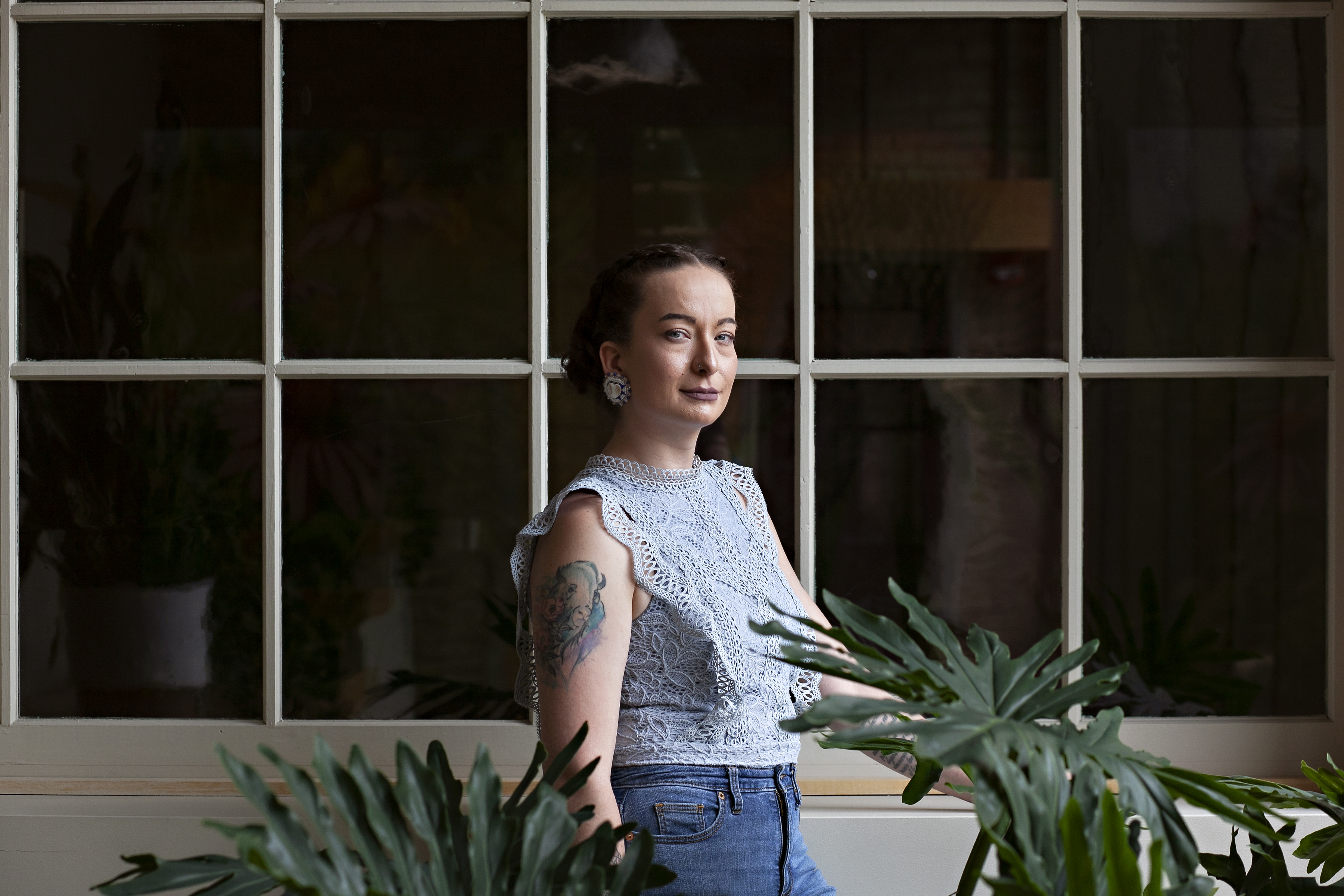 Whitney Fear, a psychiatric mental health nurse practitioner, stands for a portrait at Family HealthCare. 