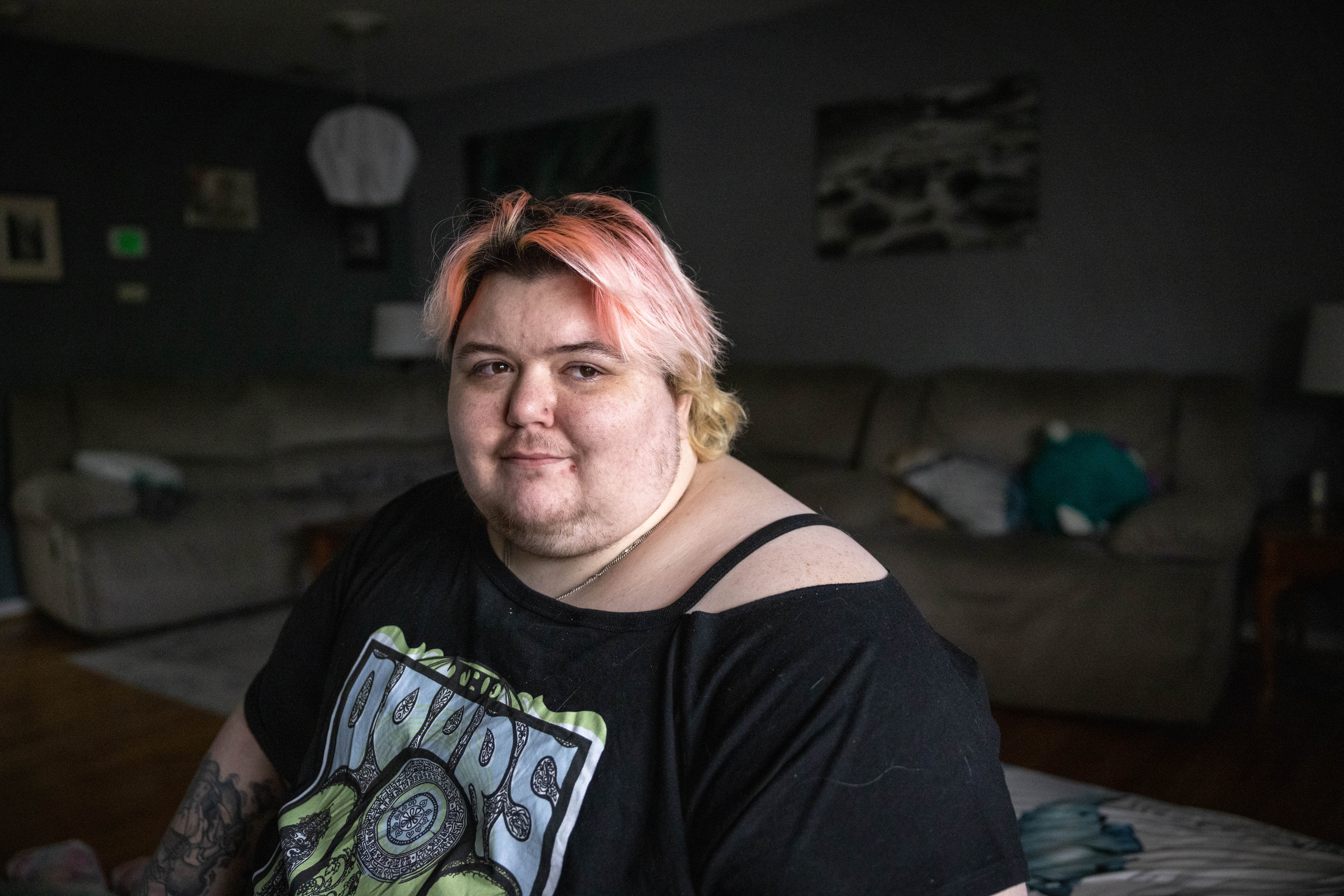 Vince Wescott poses for a portrait in his home.