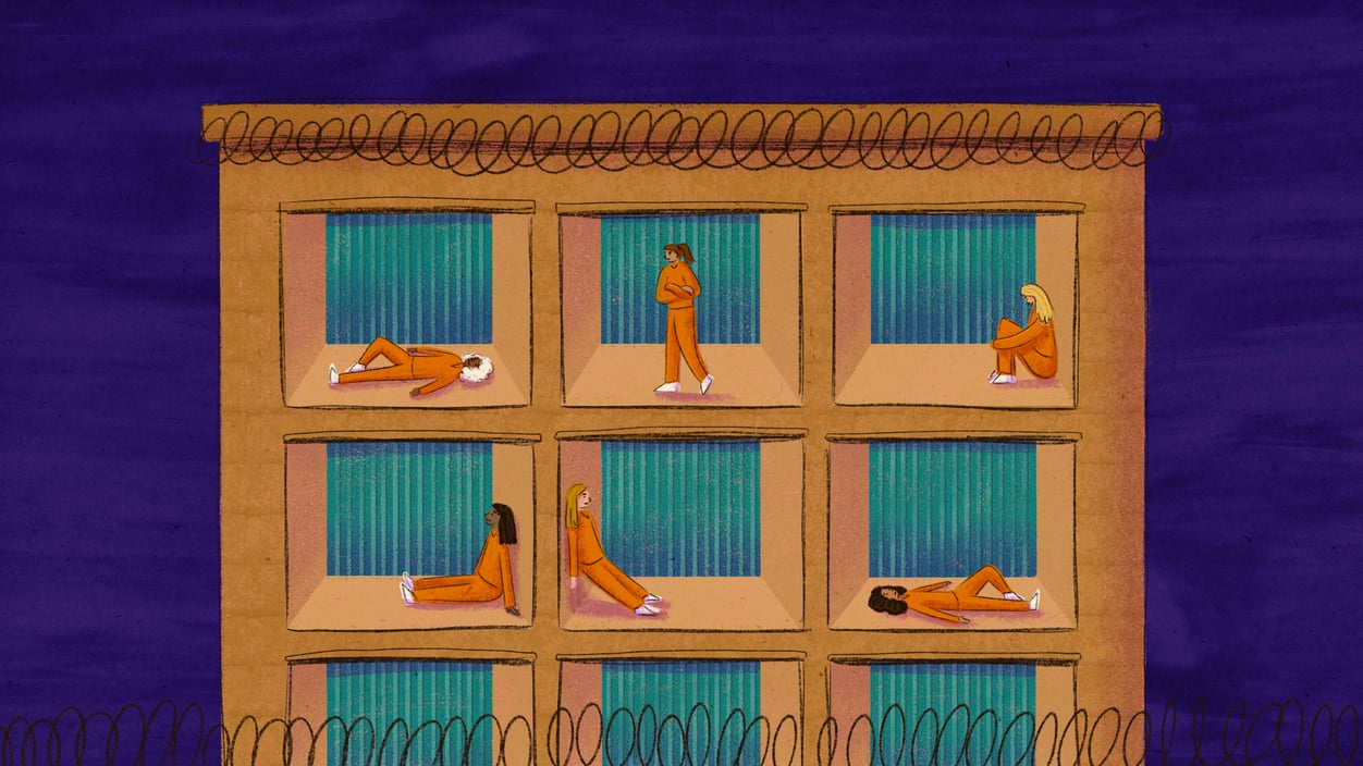 An illustration of a cross-section of a prison with women isolated in each cell.