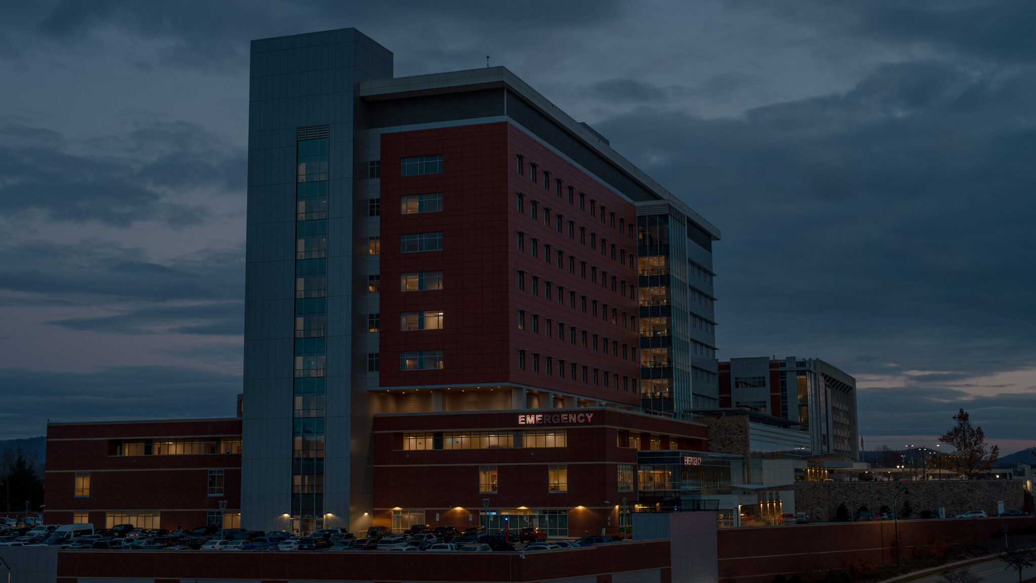 Mission Hospital emergency department photographed at night.