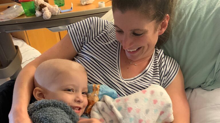 Sarah McCarthy cuddles with her daughter Molly.