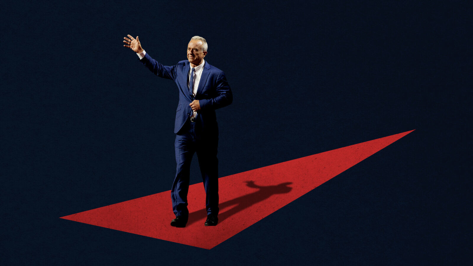 RFK Jr. waves while walking to the left end of a red triangle, which illustrates a walkway, on a dark blue background