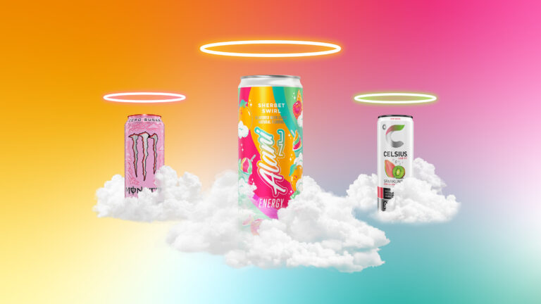 Three cans of energy drinks, bright pink and orange with pastels, sit upon clouds. Halos float above their rims. The vibe is very "Lisa Frank," if that helps at all. 